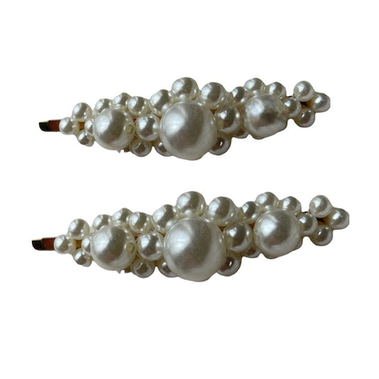 two white pearl hair clips