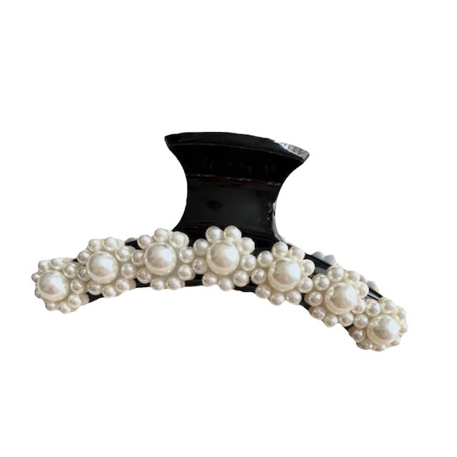 large crab claw flowers white pearls