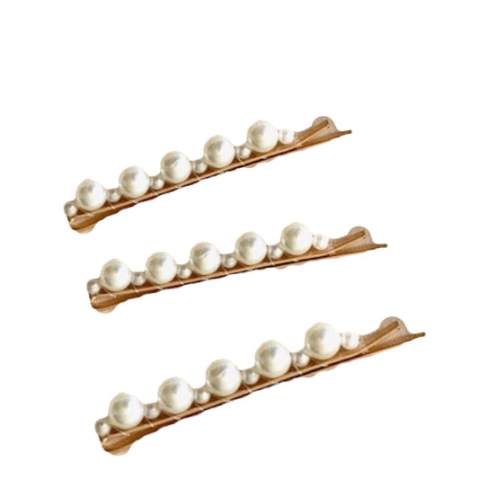 three white pearl hair clips